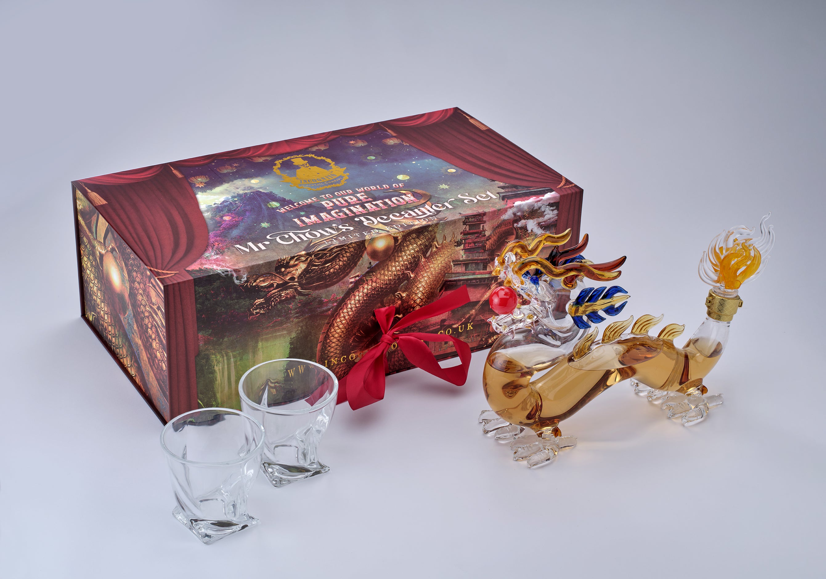Incognito Spirits Mr Chow luxury spirit gift set with premium dragon decanter filled with vodka, gin or rum and paired with 2 cut glasses presented in a signature luxury gift box and gift bag