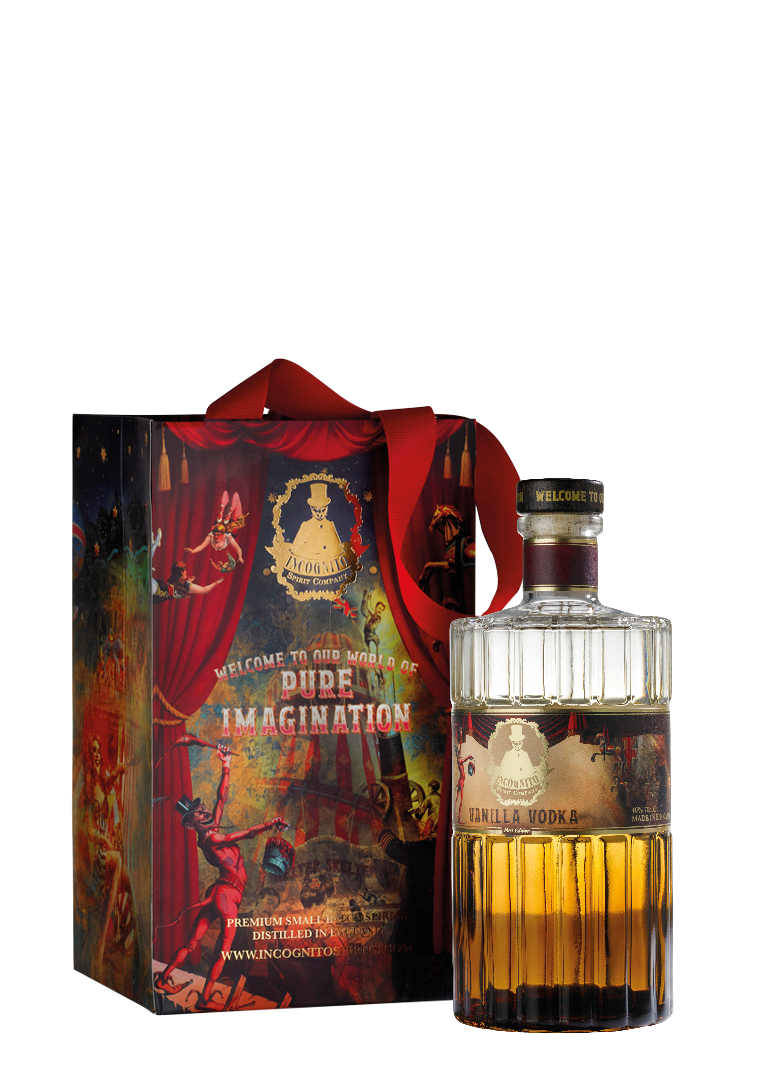 A bottle of Wildberry Vanilla Vodka next to its illustrated gift box. The box features a red ribbon handle and whimsical circus-themed artwork with the text 'Welcome to the circus of PURE IMAGINATION'.